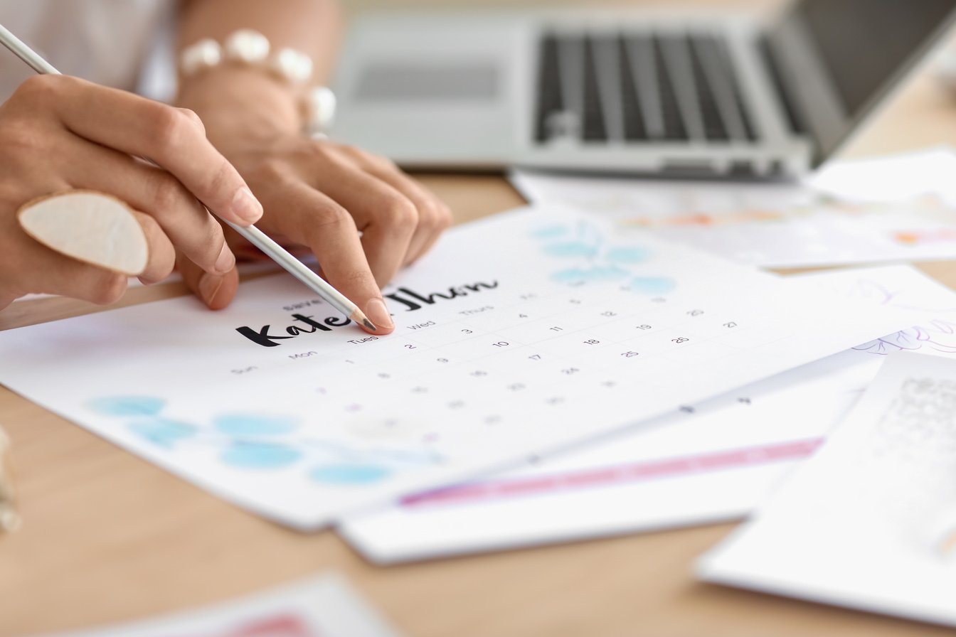 Female Wedding Planner Working in Office, Closeup